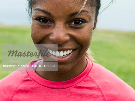 Portrait of a smiling young woman.