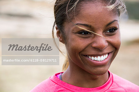 Portrait of a smiling young woman.