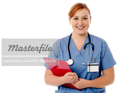 Smiling female physician posing with clipboard