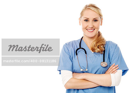 Beautiful female doctor posing with folded arms