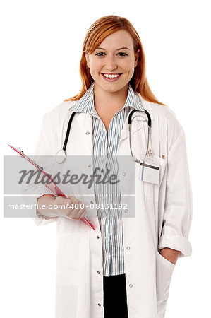 Female physician posing with clipboard and stethoscope