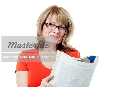 Smiling aged woman with an open book