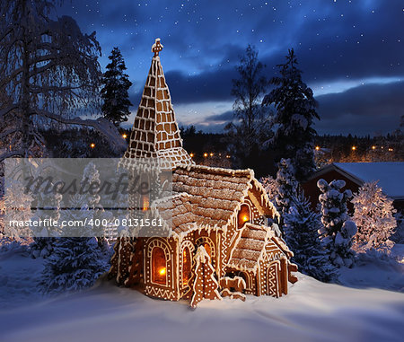 Gingerbread church snowy Christmas night