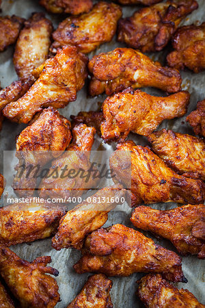 BBQ chicken wings on baking sheet