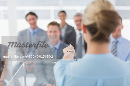 Businesswoman doing conference presentation in meeting room