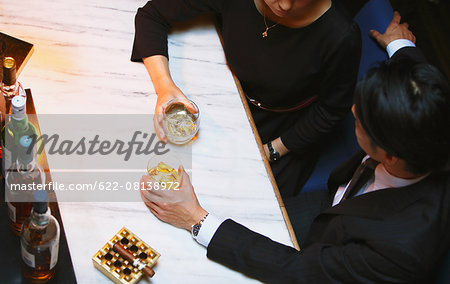 Couple drinking in a fashionable bar