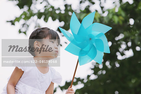 Young girl with pinwheel