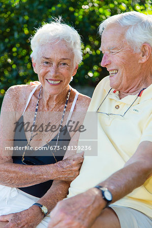 Portrait of a senior couple sitting outdoors