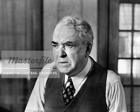 1930s 1940s ELDERLY BUSINESS MAN VEST TIE CHARACTER WORRIED SERIOUS FACIAL EXPRESSION GRUMPY MEAN ANGRY