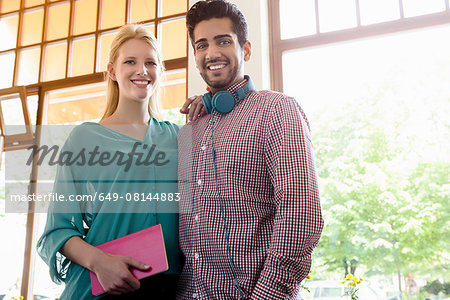 Portrait of young couple in cafe
