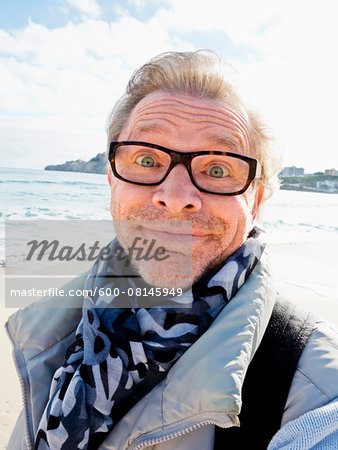 Portrait of Senior Man Outdoors making a Face, Spain