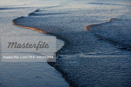 Sunrise on Waves at Pakmeng Beach, Trang, Thailand