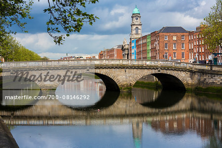 Mellows Bridge on River Liffey, with St Paul's Church tower in background, Dublin, Leinster, Ireland