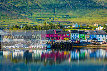Scenic view of harbour and waterfront, Portmagee, along the Skellig Coast on the Ring of Kerry, County Kerry, Ireland Scenic view of harbour and waterfront, Portmagee, along the Skellig Coast on the Ring of Kerry, County Kerry, Ireland