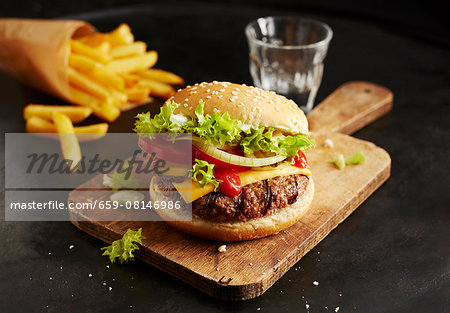 A cheeseburger and chips A cheeseburger and chips