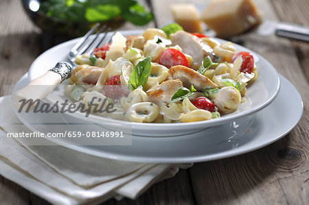 Tortellini with chicken and tomatoes in a creamy sauce
