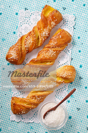 Puff pastry twists with sugar and vanilla cream