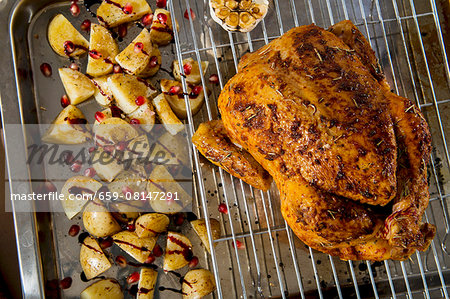 Roast chicken with balsamic potatoes and pomegranate seeds Roast chicken with balsamic potatoes and pomegranate seeds