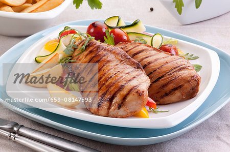 Grilled chicken breast with a vegetable salad Grilled chicken breast with a vegetable salad