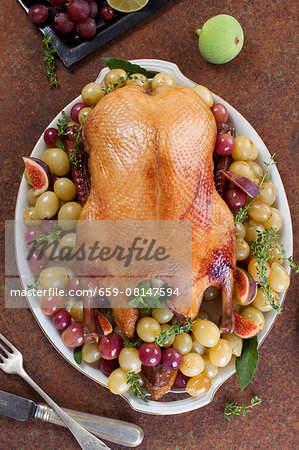 Roast duck with grapes and figs