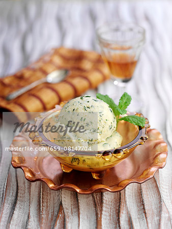 Mango and mint ice cream in a bowl