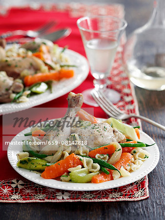 Braised chicken with vegetables and shell pasta