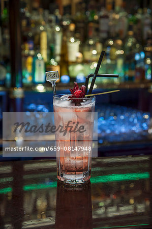 A vodka and tonic with grenadine A vodka and tonic with grenadine