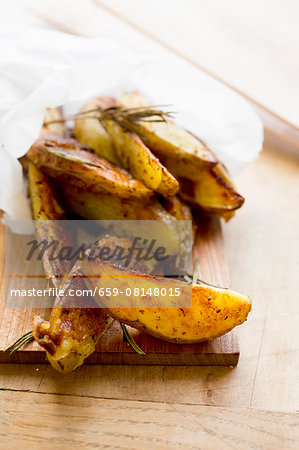 Roasted potato wedges in paper