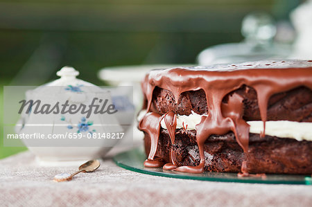 A chocolate cake with milk chocolate glaze