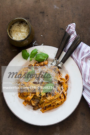 Pasta with tomato sauce and mushrooms