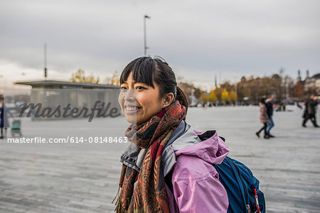 Mid adult woman in square, Zurich, Switzerland
