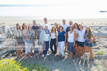 Portrait of four generation family on beach
