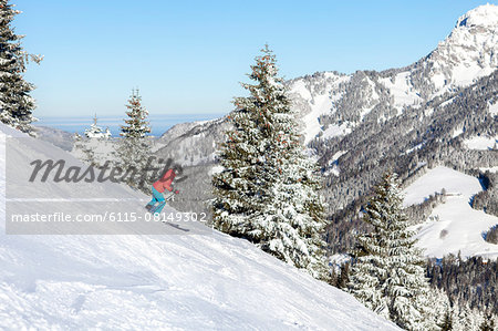 Ski holiday, Woman skiing downhill, Sudelfeld, Bavaria, Germany