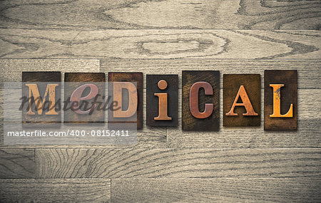 The word "MEDICAL" theme written in vintage, ink stained, wooden letterpress type on a wood grained background.