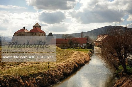 Very old castle with spring countryside in Bohemia