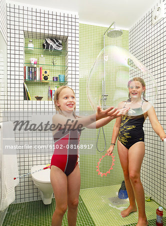 Girls playing in bathroom