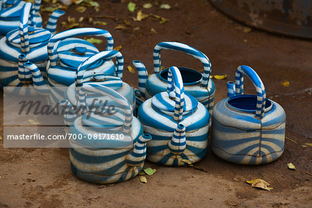 Close-up of iconic, striped, plastic kettles, used for drinking water or for washing, Ouagadougou, Burkina Faso