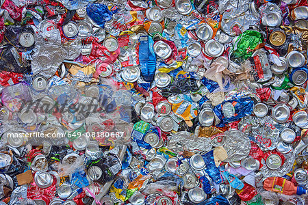 Overhead view of flattened waste aluminium and plastic packaging