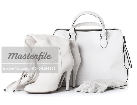 Ladies white leather gloves, bag and shoes, isolated