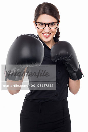 Isolated charming young female boxer over white background.