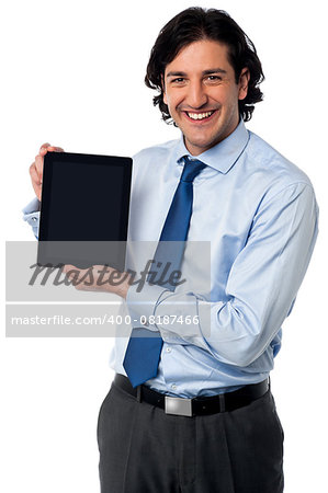 Sales representative displaying new tablet device for sale