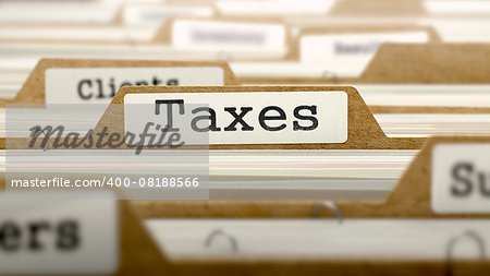 Taxes Concept. Word on Folder Register of Card Index. Selective Focus.