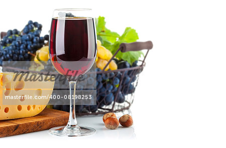 Glass red wine with grapes and cheese. Isolated on white background