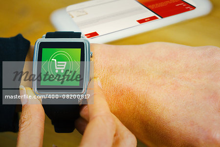 Businesswoman with smart watch on wrist against payment screen