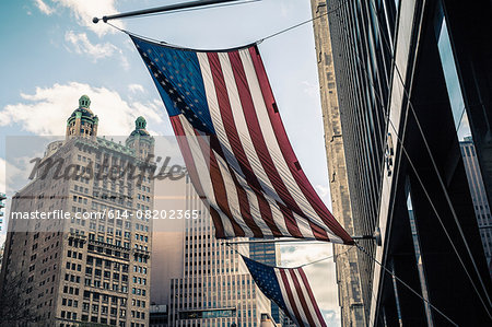View of buildings and American flags, Manhattan, New York, USA