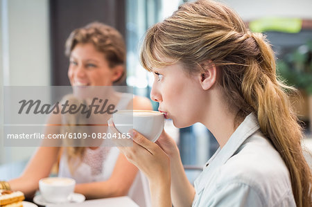 Beautiful woman drinking coffee