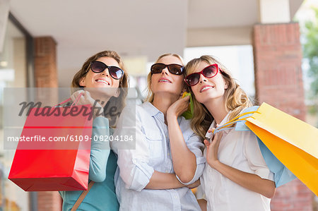 Beautiful women with shopping bags