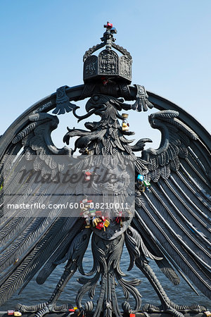 Close-up of ornate, wrought iron Imperial eagle, Weidendammer Bridge, Spree River, Berlin, Germany.