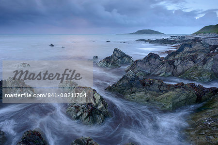 Waves swirl around Hannafore Beach at high tide, Looe, Cornwall, England, United Kingdom, Europe