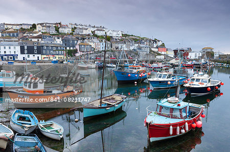 Fishing boats moored in pretty Mevagissey harbour, Cornwall, England, United Kingdom, Europe Fishing boats moored in pretty Mevagissey harbour, Cornwall, England, United Kingdom, Europe